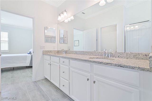 bathroom with tile patterned flooring, vanity, and ornamental molding