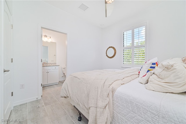 bedroom featuring connected bathroom