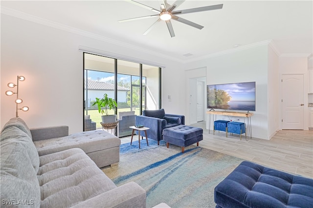 living room featuring ceiling fan, crown molding, and light hardwood / wood-style flooring