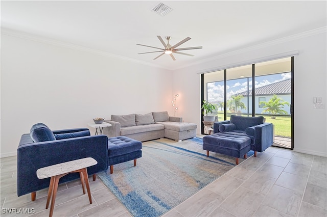 living room with ceiling fan and crown molding