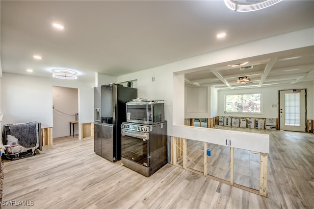 kitchen with coffered ceiling, light hardwood / wood-style floors, stainless steel appliances, and beam ceiling