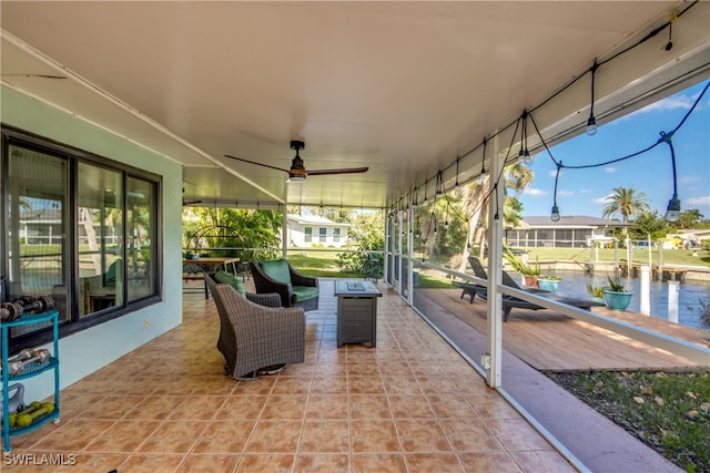 view of patio featuring ceiling fan