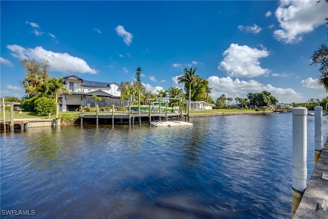 dock area with a water view