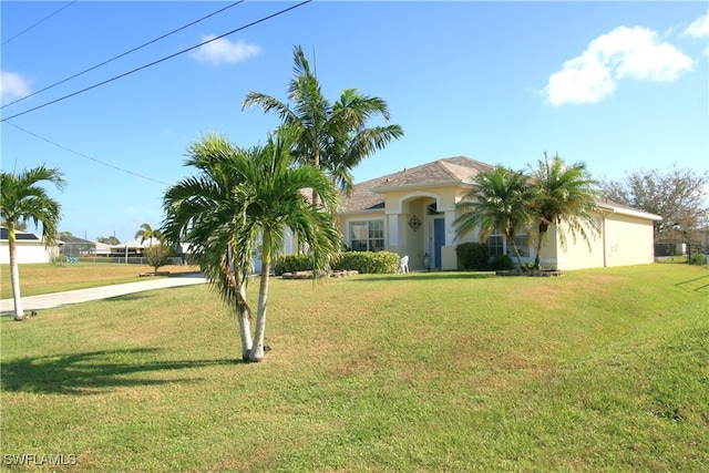 view of front of house with a front lawn