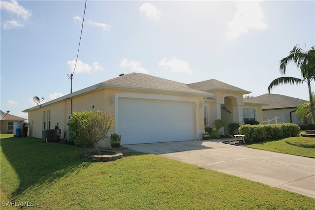 view of front facade with central AC, a front yard, and a garage