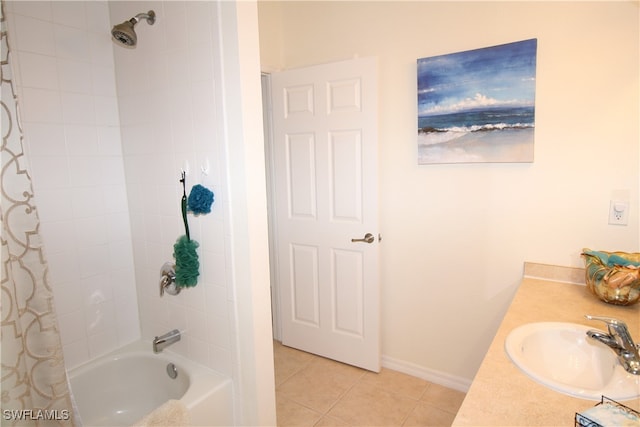 bathroom featuring vanity, shower / tub combo, and tile patterned flooring