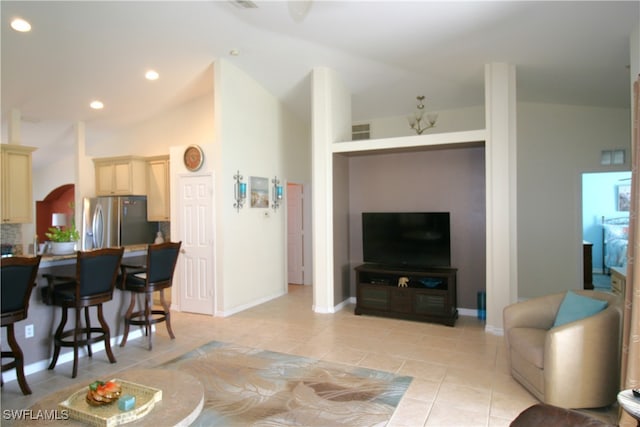 tiled living room with lofted ceiling