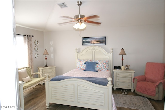 bedroom featuring dark hardwood / wood-style floors and ceiling fan