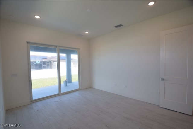 empty room with light wood-type flooring