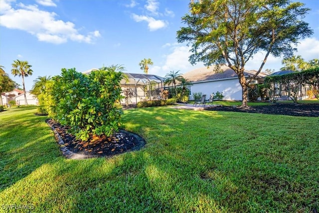 view of yard with a lanai