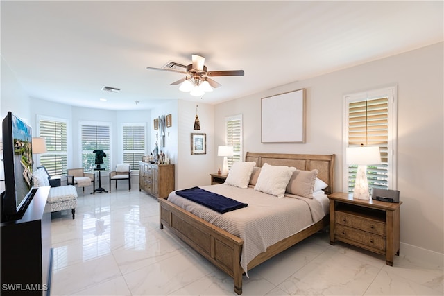 bedroom featuring ceiling fan