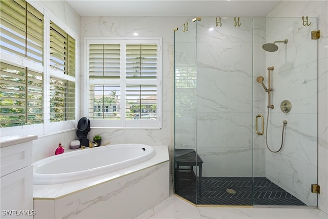 1045 Cottonwood Ct, Marco Island, FL 34145 - bathroom with a marble finish shower, a garden tub, and marble finish flooring