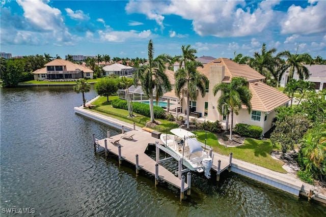 1045 Cottonwood Ct, Marco Island, FL 34145 - dock featuring boat lift, a water view, glass enclosure, and a residential view