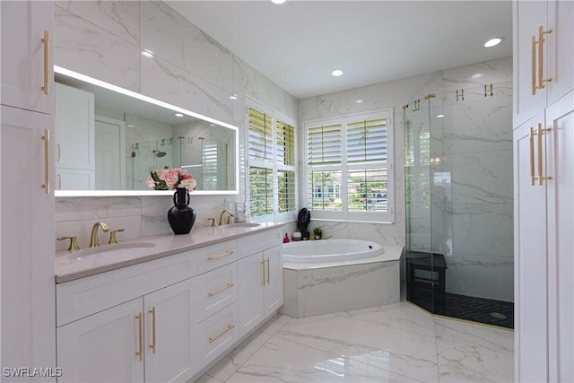 1045 Cottonwood Ct, Marco Island, FL 34145 - full bath featuring a marble finish shower, marble tiled flooring, a garden tub, double vanity, and recessed lighting
