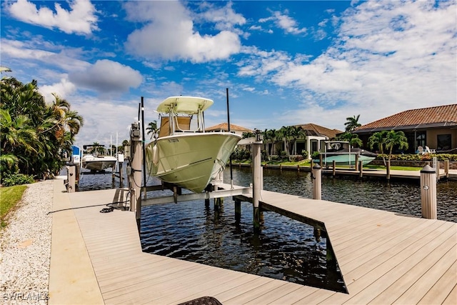 1045 Cottonwood Ct, Marco Island, FL 34145 - dock with boat lift and a water view