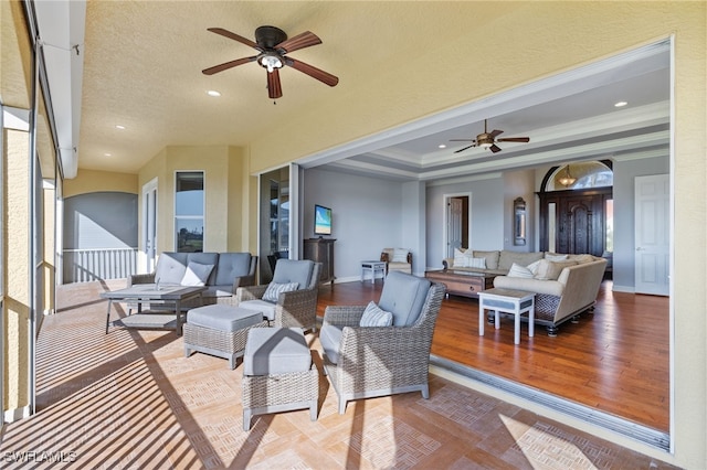 view of patio featuring ceiling fan and an outdoor hangout area