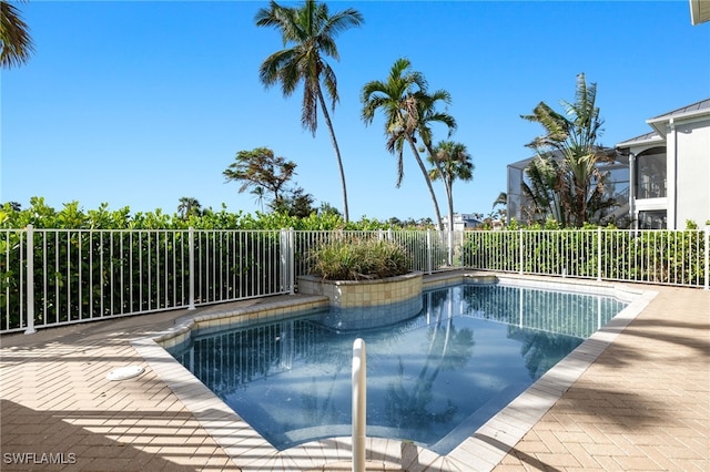 view of pool featuring a patio area