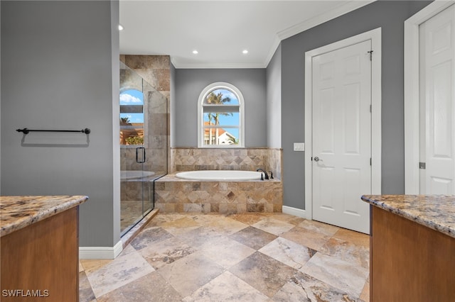 bathroom featuring ornamental molding, shower with separate bathtub, and vanity