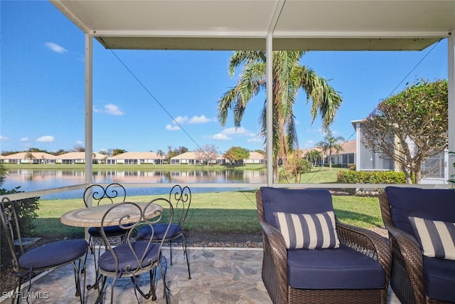 view of patio / terrace with a water view