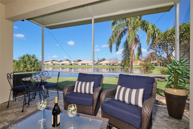 view of patio with a water view