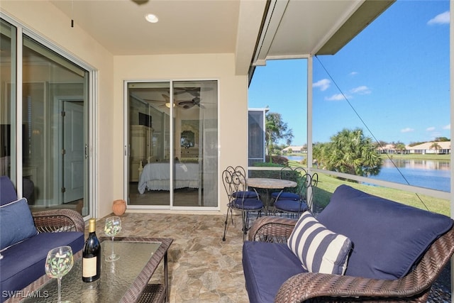 view of patio / terrace featuring a water view