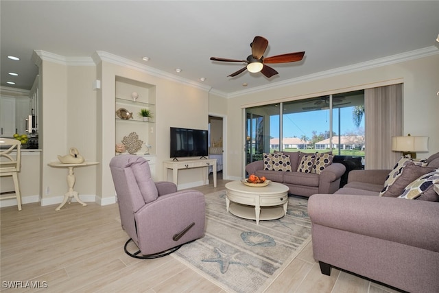 living room with ceiling fan, ornamental molding, and light hardwood / wood-style flooring