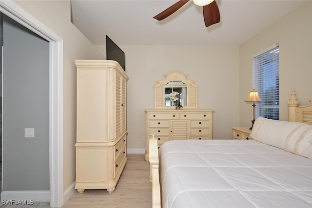 bedroom featuring light hardwood / wood-style floors and ceiling fan