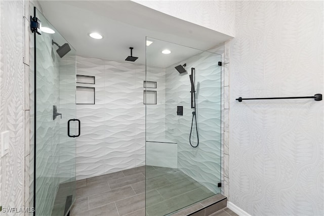 bathroom featuring an enclosed shower