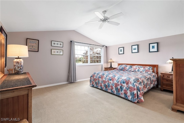 bedroom with carpet, vaulted ceiling, and ceiling fan