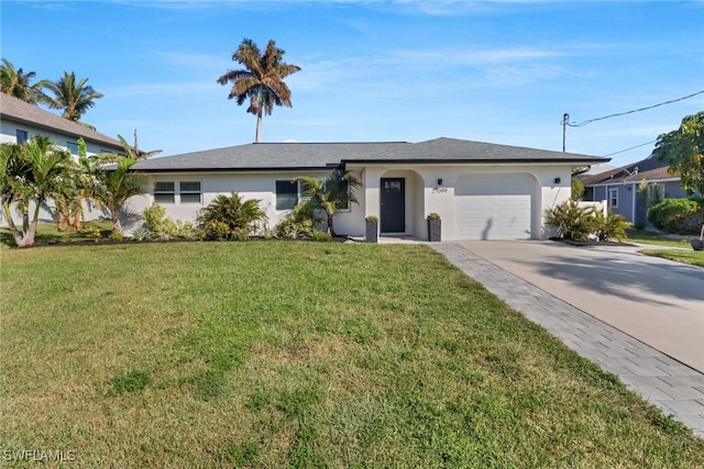 ranch-style home with a front yard and a garage