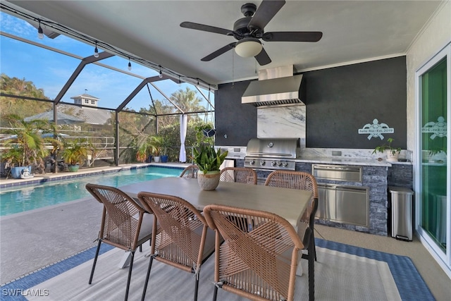 view of patio / terrace with an outdoor kitchen, a grill, glass enclosure, and ceiling fan