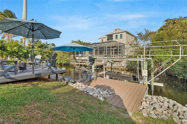 dock area with a water view