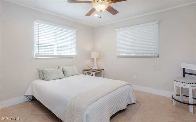 tiled bedroom with ceiling fan