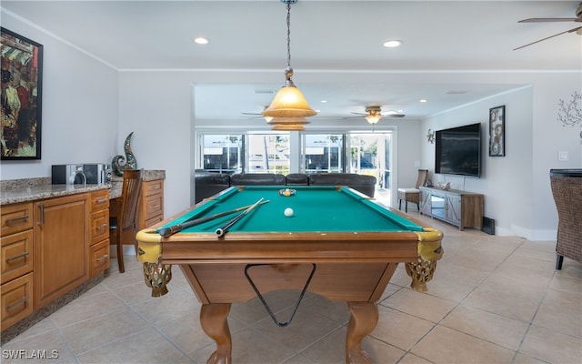 recreation room with ceiling fan, billiards, and light tile patterned floors