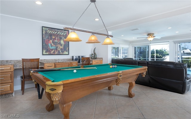 game room featuring pool table, crown molding, light tile patterned floors, and ceiling fan