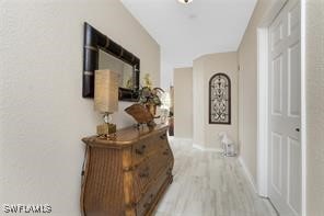 hallway featuring light hardwood / wood-style flooring