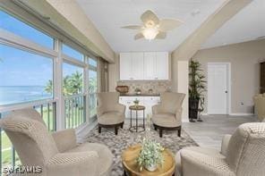 1250 W Marion Ave Unit 242, Punta Gorda, FL 33950 - living room featuring baseboards, a ceiling fan, and wood finished floors