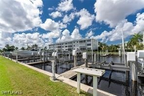 dock area featuring a water view