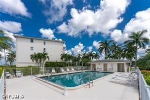1250 W Marion Ave Unit 242, Punta Gorda, FL 33950 - community pool featuring a patio area