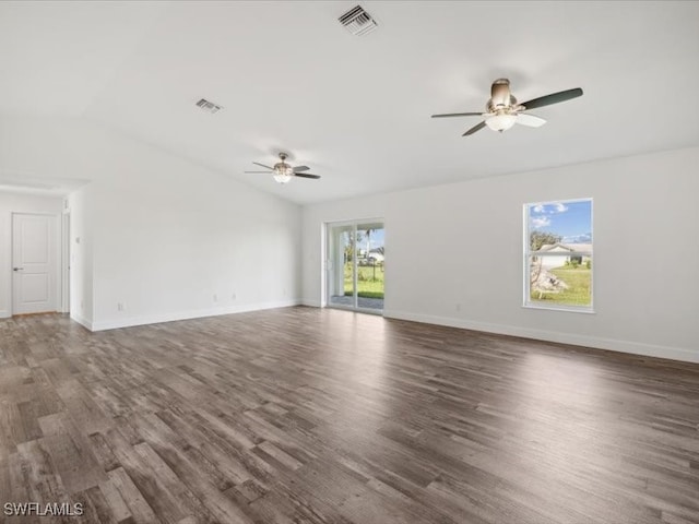 unfurnished living room with lofted ceiling, dark hardwood / wood-style floors, and ceiling fan