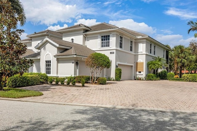 view of front of home with a garage