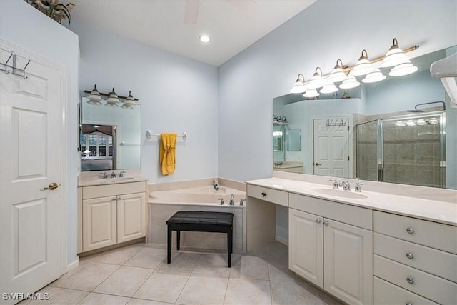 bathroom with vanity, tile patterned flooring, and independent shower and bath