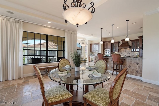 2546 Marquesa Royale Ln Unit 7-302, Naples, FL 34109 - dining room featuring stone tile flooring, a chandelier, recessed lighting, and baseboards