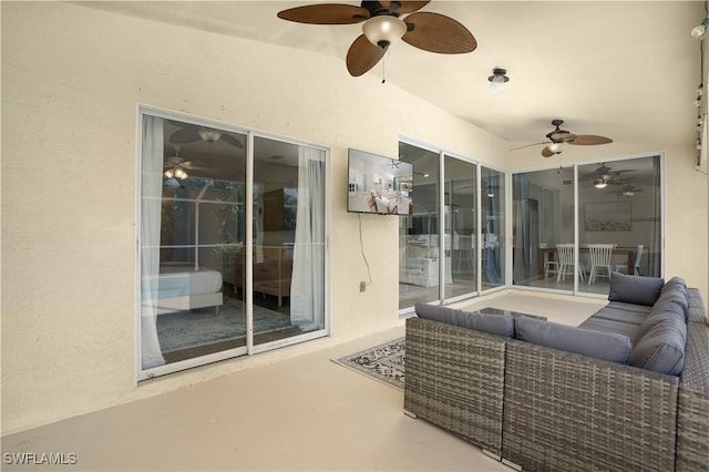 view of patio featuring outdoor lounge area and ceiling fan