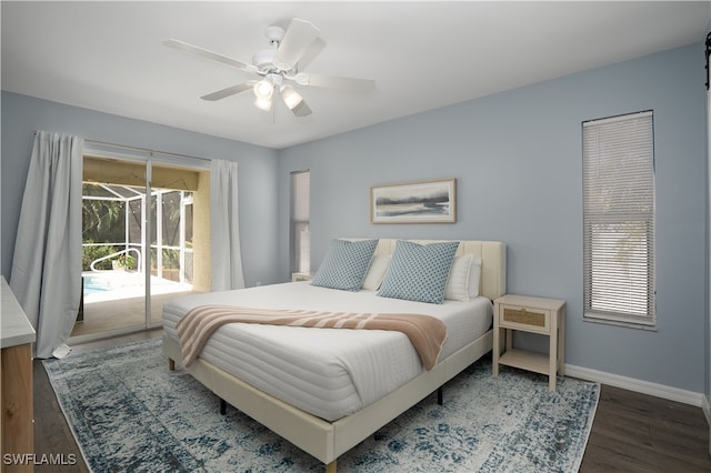 bedroom featuring dark hardwood / wood-style floors, access to outside, and ceiling fan