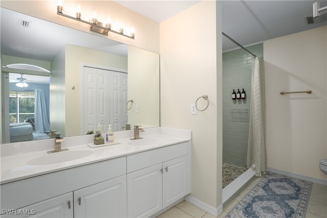 bathroom featuring vanity, a shower with curtain, tile patterned flooring, and ceiling fan