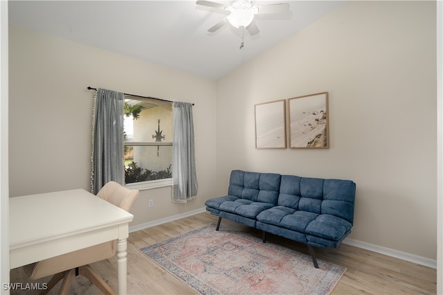 sitting room featuring lofted ceiling, light wood-type flooring, and ceiling fan