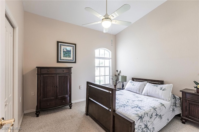 bedroom with light carpet and ceiling fan