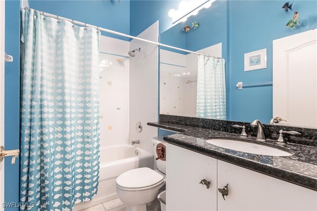 full bathroom featuring vanity, shower / tub combo, toilet, and tile patterned floors