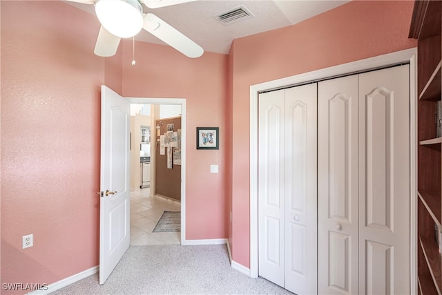 corridor with light tile patterned floors